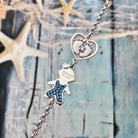 Браслет с фигуркой мальчика и сердцем из серебра 925 в интернет ...