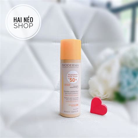 Kem chống nắng makeup có màu Bioderma Photoderm Nude Touch SPF 50 màu Light cho da tự nhiên