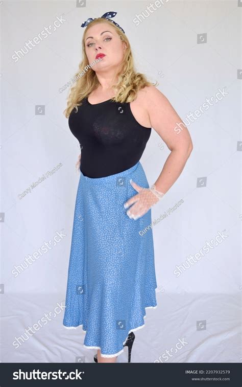 Beautiful Blonde Busty Model Wearing Vintage Stock Photo