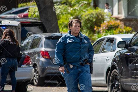 A Black Female Detective From Lapd`s Metro Division Walks By Police