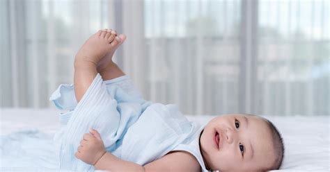 Why Do Babies Put Their Feet In The Air? It's More Than A Cute Quirk