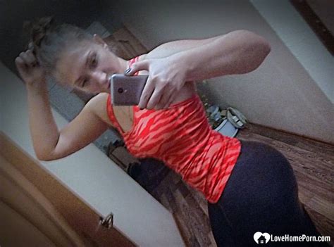 Brunette Amateur Shows Off Her Big Ass While Taking Nude Selfies CoedCherry