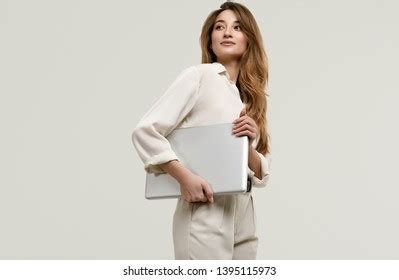 130 Gorgeous Brunette Model Posing In White Clothes With Laptop Images Stock Photos 3D Objects