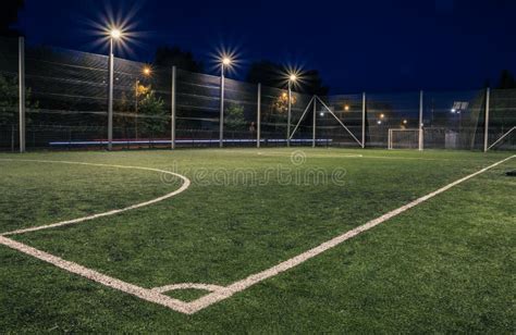 An Amateur Soccer Field Illuminated At Night A Small Football Field Lit By Lanterns In The