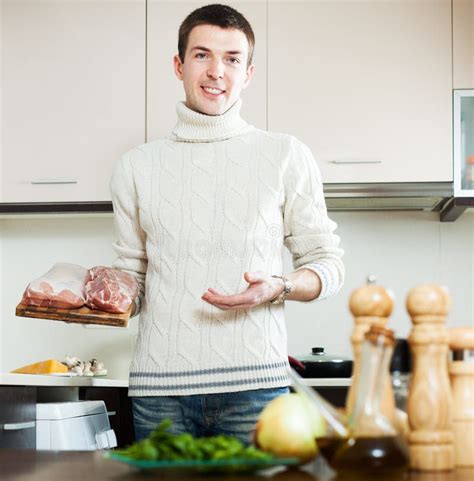 Smiling Guy Cooking At Home Stock Photo Image Of House Handsome