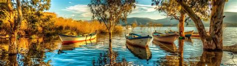 Türkiye landscape with boats and trees at sea 2K wallpaper download