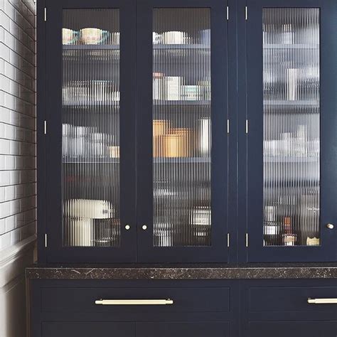 Great Dark Blue Cabinets With Fluted Glass Living Room Glass Cabinet Glass Kitchen Cabinets