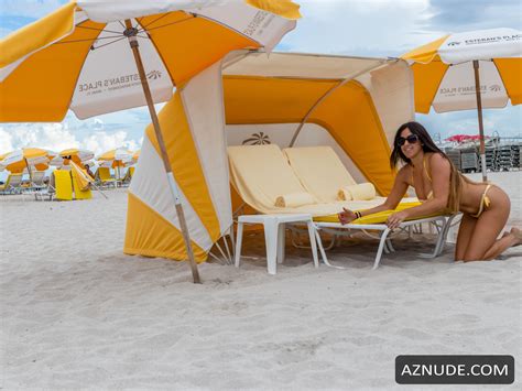Claudia Romani Sexy On South Beach Wearing A Yellow And White Thong Bikini Aznude