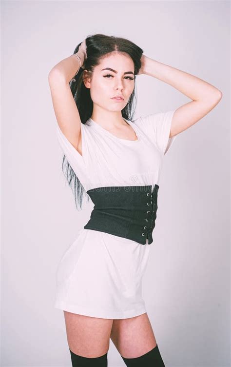 Girl Brunette Wears Fashionable Dress And Stockings Fashionable Outfit Concept Stock Image