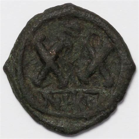 Ancient Byzantine Coin Tiberius Ii Constantine Half Follis Ad