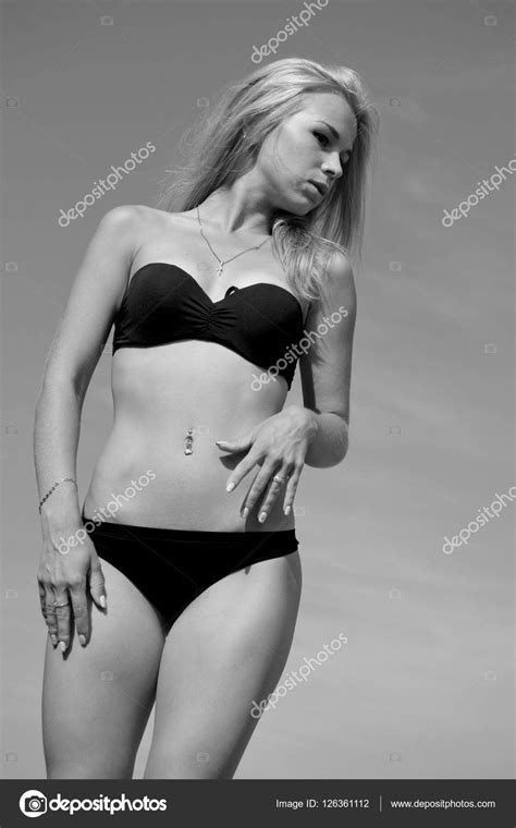 Sexy Blonde In A Swimsuit Stock Photo By Rrraum 126361112