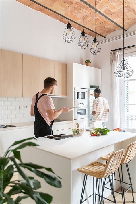 Gay Couple Preparing To Have Lunch Together By Stocksy Contributor Hernandez Sorokina