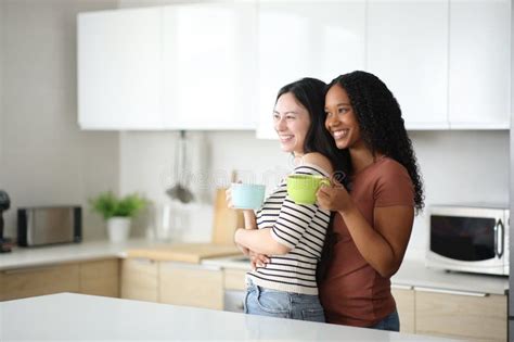 Lesbian Interracial Couple In The Kitchan At Breakfast Stock Image Image Of Dream Future