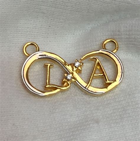 Exotic Infinity Gold Pendant