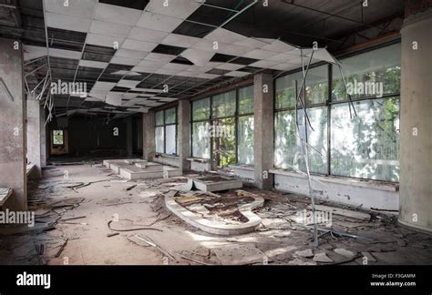 Abandoned Building Interior Corridor Perspective With Broken Ceiling