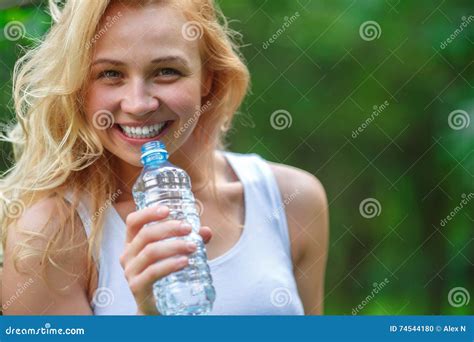 Cute Blonde Girl Holding Plastic Bottle Of Water Stock Photo Image Of Lifestyle Closeup 74544180