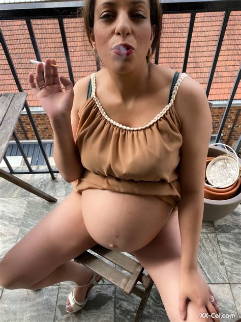 Pregnant Smoker Leila Teasing Nude With Her Bulging Tummy Her Dark Nipples CoedCherry