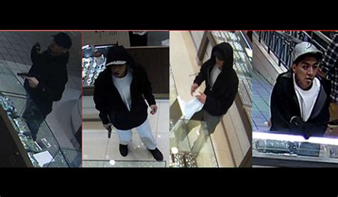 Surveillance Photos Show Jewelry Store Armed Robbery Suspects At South