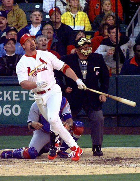 McGwire Watches The Flight Of The Ball During His Fifth Inning Grand