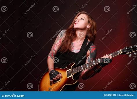 Rock'n Roll Girl With Tattoo Stock Photo - Image: 38822020