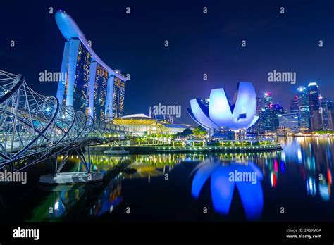 A night view of Marina Bay in Singapore, including the Marina Bay Sands ...