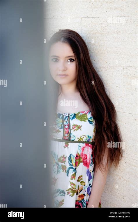 Spanish Brunette Girl With Long Hair On The Street Stock Photo Alamy