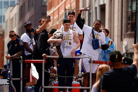 Denver Nuggets guard Christian Braun (L) and forward Peyton Watson (R ...