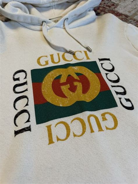 Gucci gucci fake logo cream hoodie | Grailed