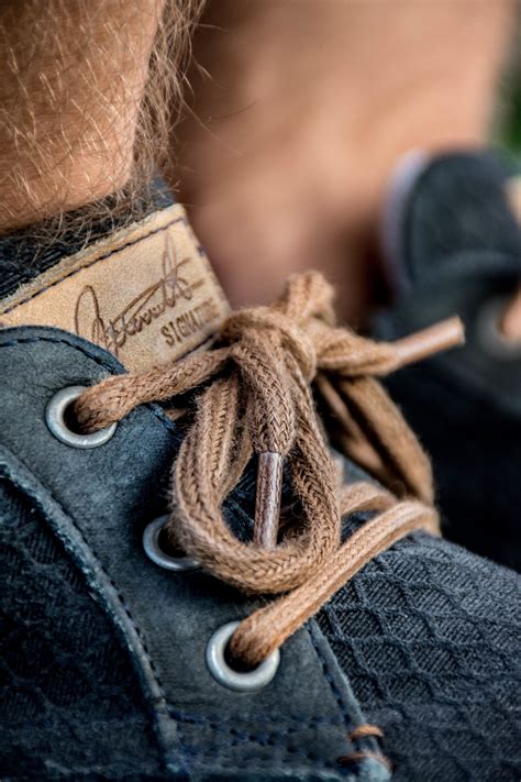 images hand shoe close  textile footwear