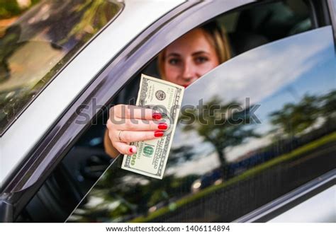 Smiling Blonde Girl Offers Money Bribe Stock Photo Shutterstock