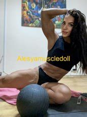 Strong Brunette Babe Alesya Showing Off Her Big Muscles Photos