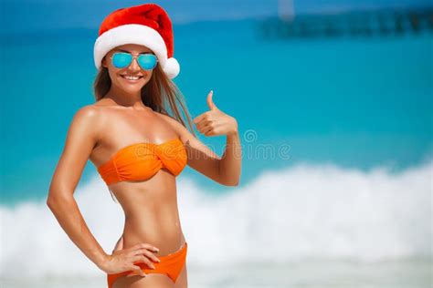 Maiden In Orange Bikini And Hat Of Santa Claus Stock Image Image Of Idyllic Christmas