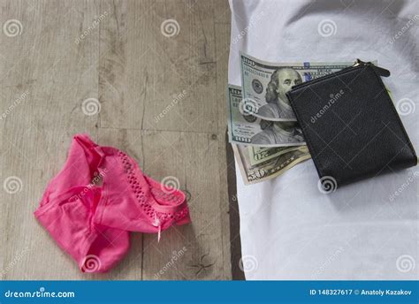 Love For Money Is Prostitution Crumpled Bed Underwear And Money As Payment For Sex Stock Image