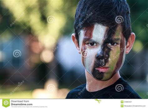 Boy In Camouflage Stock Image Image Of Tough Frown 34860407