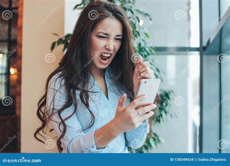 Beautiful Charming Brunette Angry Asian Girl Screaming On Phone In Cafe Stock Photo Image Of