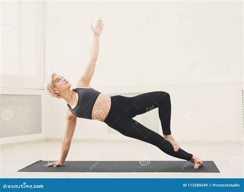 Woman Training Yoga In Side Plank Pose Stock Image Image Of Person