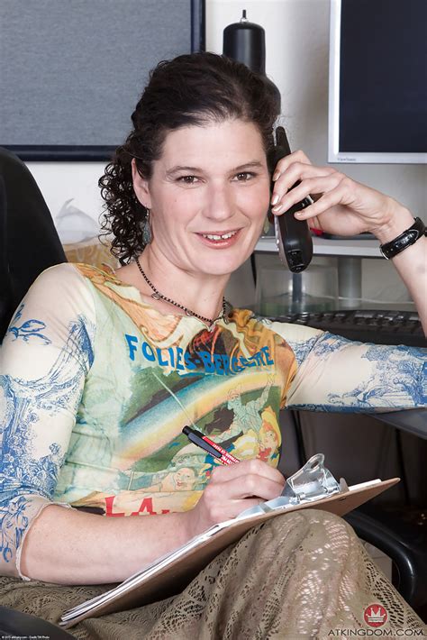 Aged Secretary Sunshine Lets Her Ever Growing Beaver Loose From Skirt Porn Pictures XXX Photos