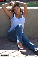 Hot Brunette Babe Shoes Off Her Body In A Sexy Clothed Photoshoot Photos