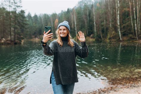 Happy Blonde Woman Makes Selfie Mobile Photo Enjoying Mountain Lake Landscape Nature Freedom