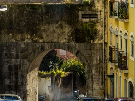 photo stone arch arch cliff landscape   jooinn
