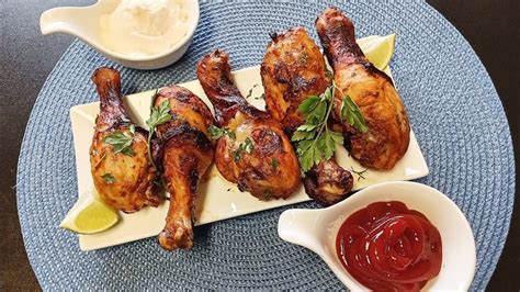 Chicken Wings On A Plate With Ketchup And Sauce