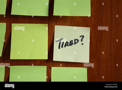 Tired Written On Post It Note Memo Stock Photo Alamy