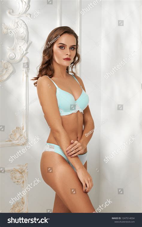 Beautiful Busty Brunette Woman Light Blue Stock Photo Shutterstock