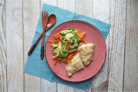 Premium Photo Tasty Fillet Of Grilled Fish And Vegetable Salad In A Plate