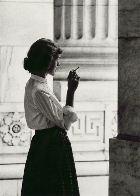 Elegant Young Woman Smoking a Cigarette in New York City Black and