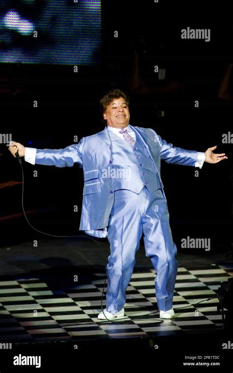 Mexican singer Juan Gabriel, performs during his latest tour entitled "Gala Encounter with Juan ...