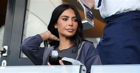 Kim Kardashian Shows Off Her Curves In Revealing Pink Bikini