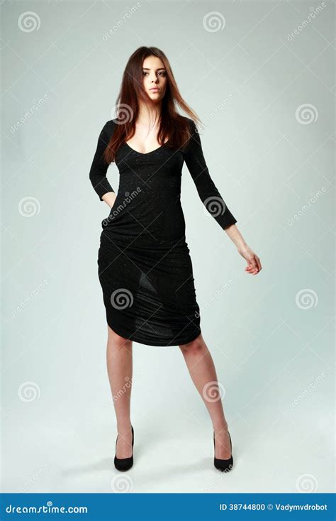 Young Beautiful Woman In Black Dress Standing Stock Photo Image Of