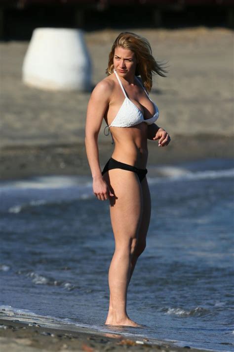 Gemma Atkinson Flaunts Washboard Abs In Black And White Bikini As She