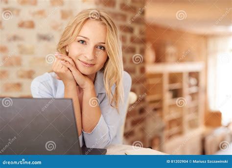 Caucasian Woman With Blonde Hair Sitting In A Coffee Shop Stock Photo Image Of Shop Female